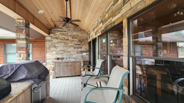 deck featuring grilling area and ceiling fan