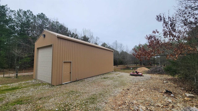 view of outbuilding with a garage