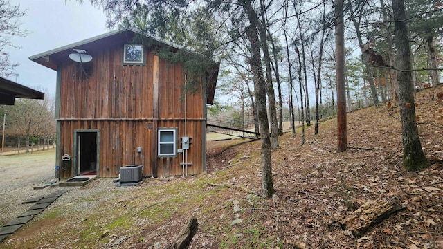 view of outdoor structure with central AC unit