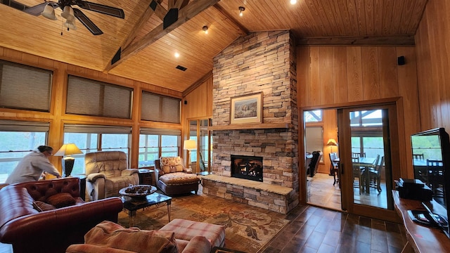 living room featuring wood ceiling, beam ceiling, high vaulted ceiling, dark hardwood / wood-style floors, and a fireplace