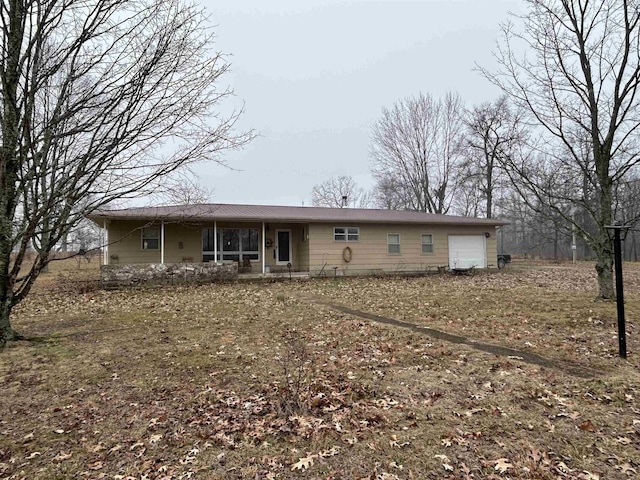 single story home with a garage