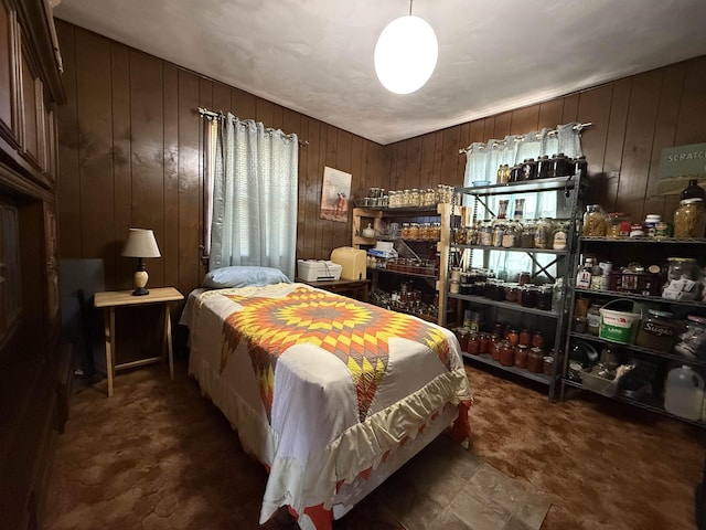 bedroom with wooden walls