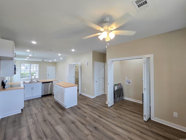 111 Brigance St, Marked Tree, AR 72365 - kitchen featuring sink, white cabinetry, wooden counters, light hardwood / wood-style flooring, and stainless steel appliances