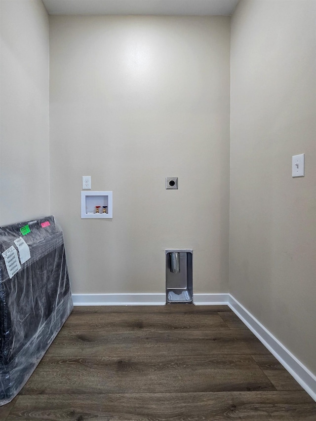 111 Brigance St, Marked Tree, AR 72365 - washroom featuring washer hookup, hookup for an electric dryer, and dark hardwood / wood-style flooring