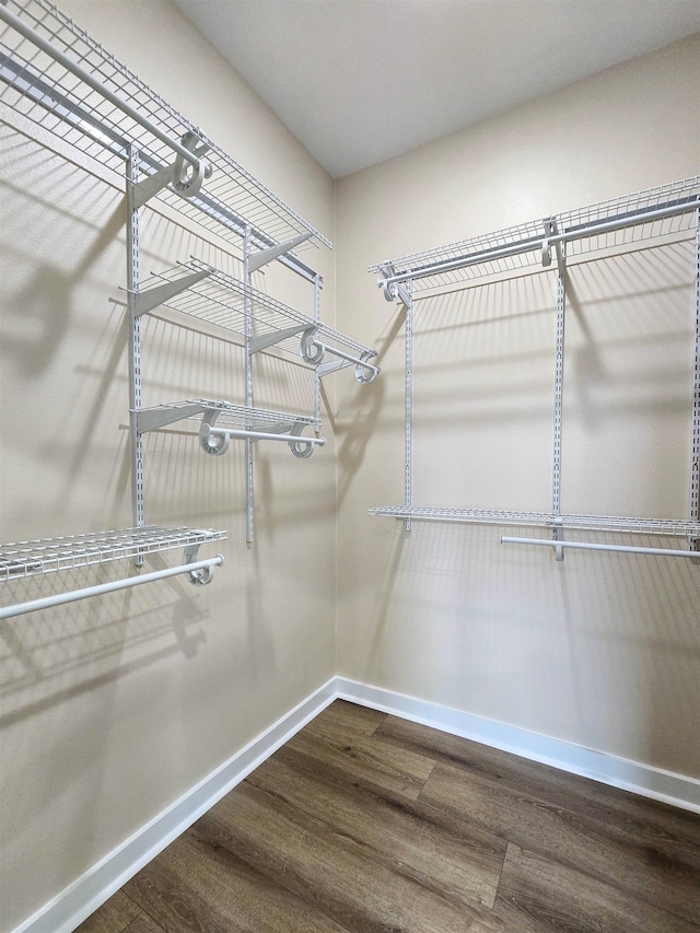 111 Brigance St, Marked Tree, AR 72365 - spacious closet featuring hardwood / wood-style floors