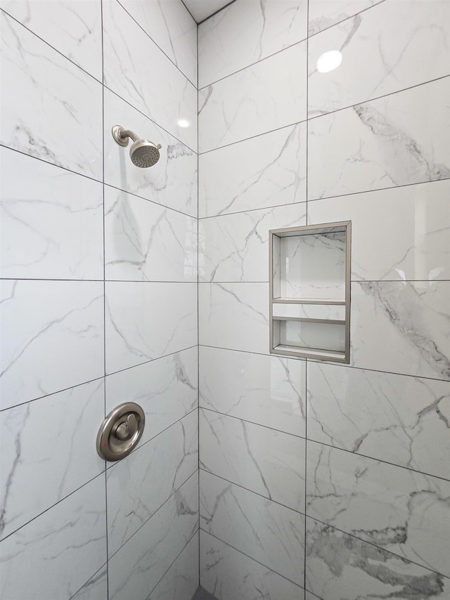 111 Brigance St, Marked Tree, AR 72365 - bathroom featuring a tile shower