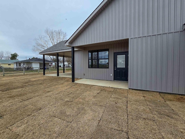 111 Brigance St, Marked Tree, AR 72365 - property entrance featuring a lawn and a patio