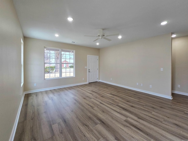 111 Brigance St, Marked Tree, AR 72365 - empty room with wood-type flooring and ceiling fan