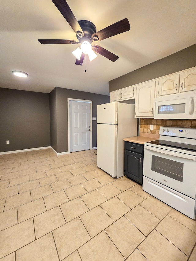 kitchen featuring light tile patterned floors, ceiling fan, white cabinets, white appliances, and backsplash