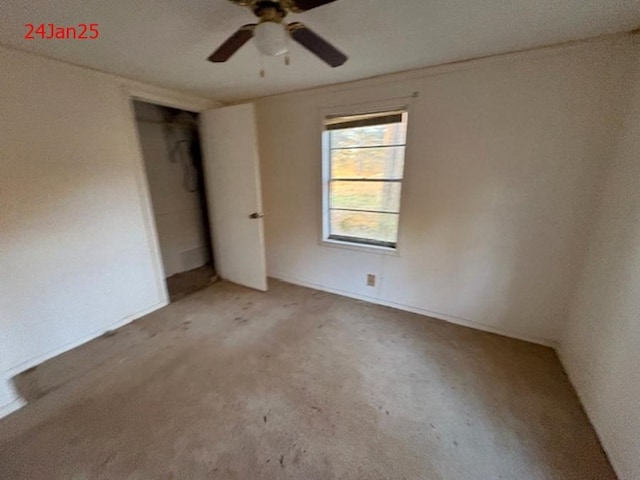 unfurnished bedroom with ceiling fan and light carpet