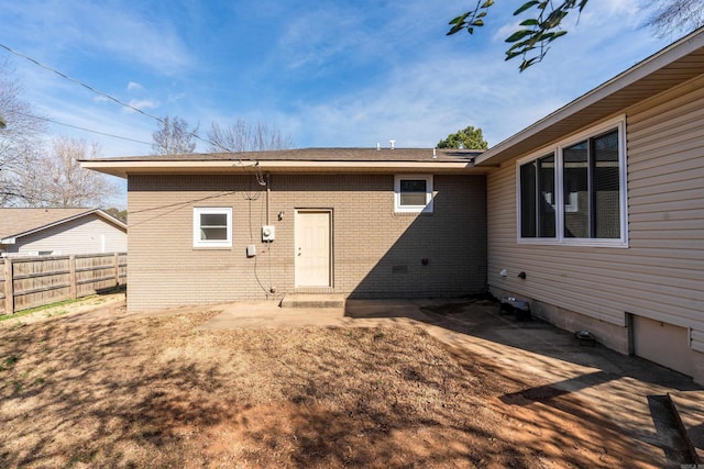 back of property featuring a patio