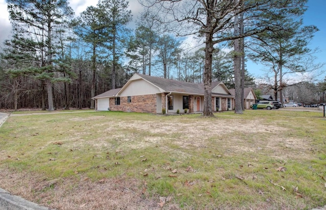 ranch-style home featuring a front yard