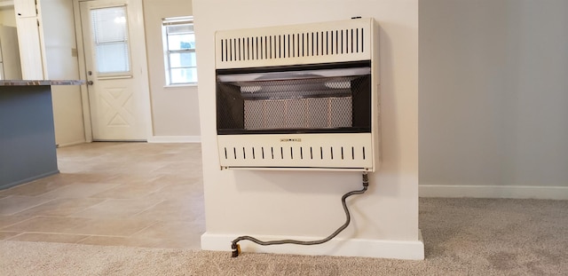 interior details with carpet and heating unit