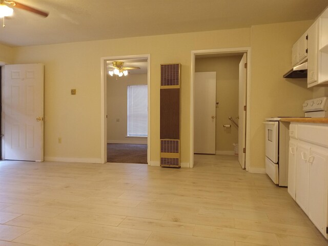 kitchen featuring white cabinetry, light wood-type flooring, ceiling fan, and white range with electric cooktop