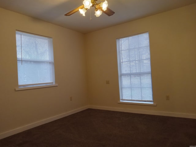 carpeted empty room with ceiling fan