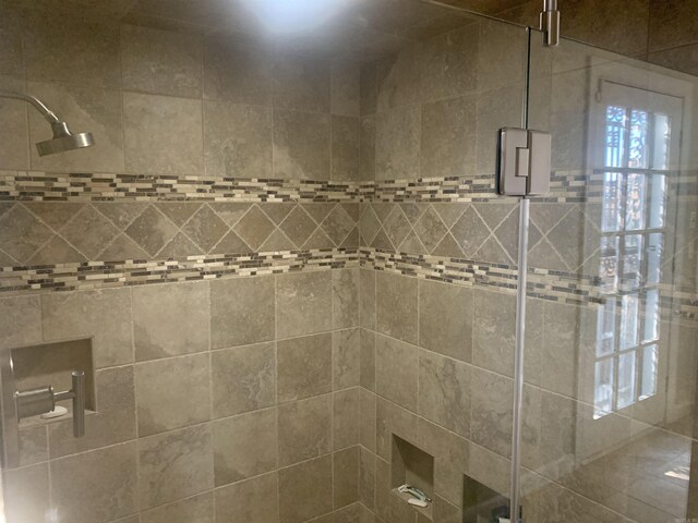 bathroom featuring walk in shower