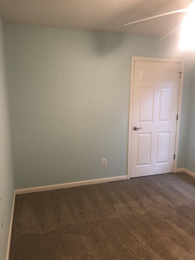 spare room with carpet flooring