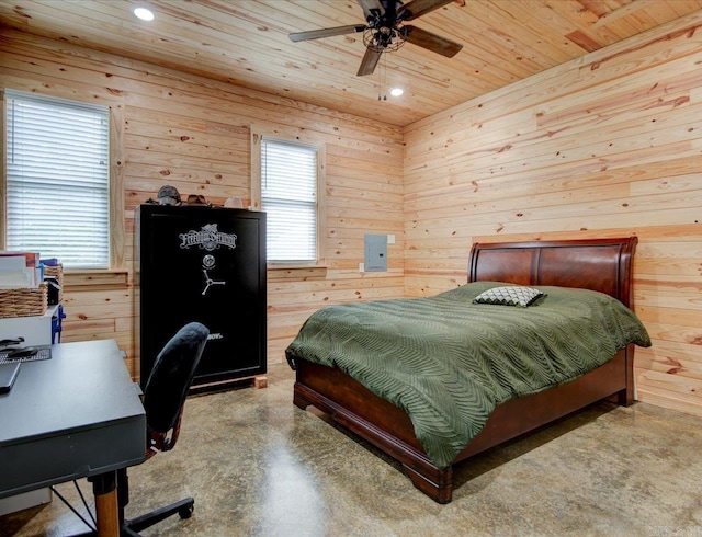 bedroom with ceiling fan, wooden walls, concrete flooring, and wooden ceiling