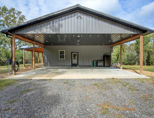 exterior space with a carport