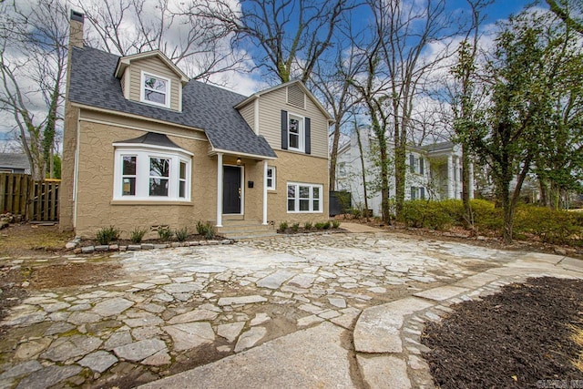 view of front of house with a patio area