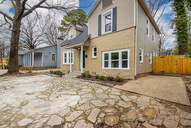 view of front facade featuring a patio area