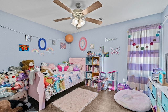 bedroom featuring ceiling fan and hardwood / wood-style floors