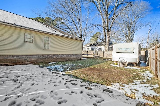 view of yard covered in snow