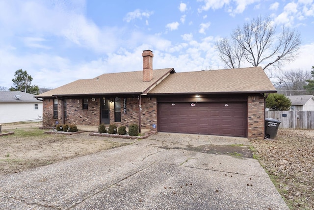 single story home with a garage