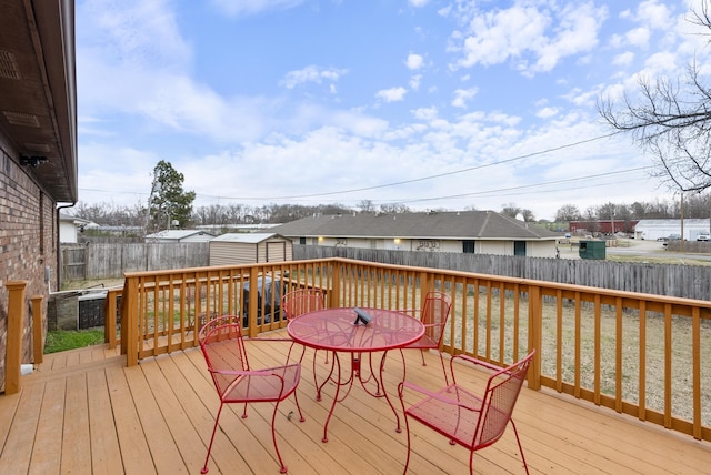 deck featuring a storage unit