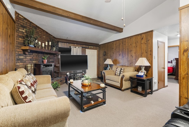 living room with wood walls, light colored carpet, and vaulted ceiling with beams