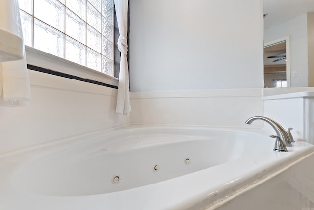 bathroom featuring a tub