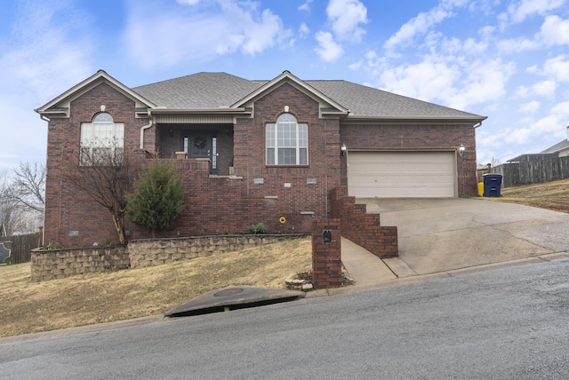 single story home featuring a garage