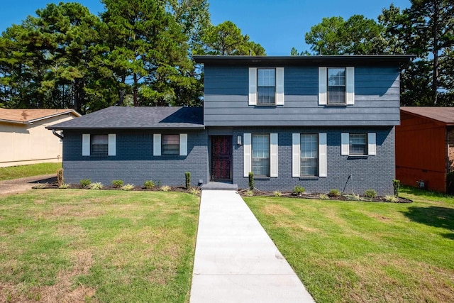 view of front facade with a front lawn