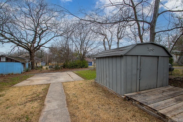 view of outbuilding featuring a yard