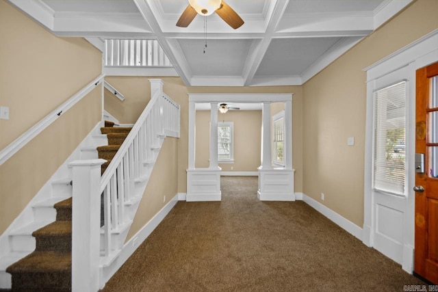 stairs with coffered ceiling, carpet floors, ceiling fan, beam ceiling, and decorative columns