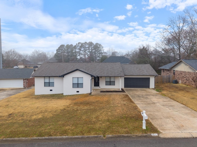 ranch-style home with a garage and a front lawn