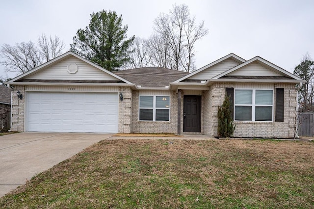 ranch-style house with a garage and a front yard