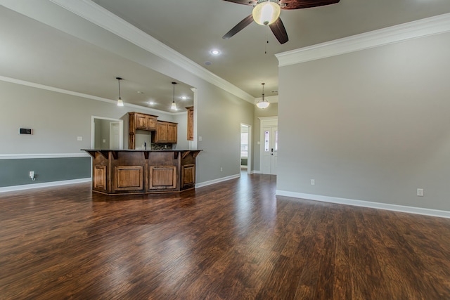 unfurnished living room with dark hardwood / wood-style flooring, crown molding, and ceiling fan