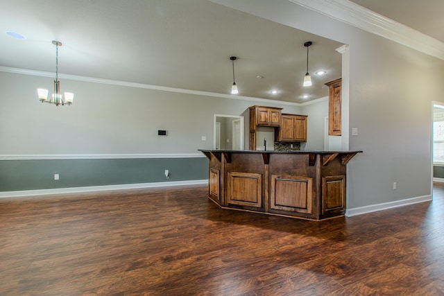 kitchen with pendant lighting, a kitchen breakfast bar, dark hardwood / wood-style floors, and an inviting chandelier