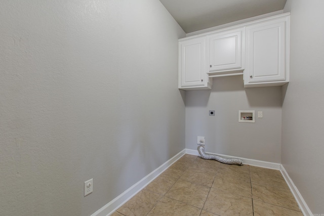 clothes washing area featuring cabinets, washer hookup, light tile patterned floors, and electric dryer hookup