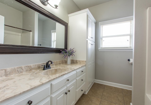 bathroom featuring vanity and tile patterned floors