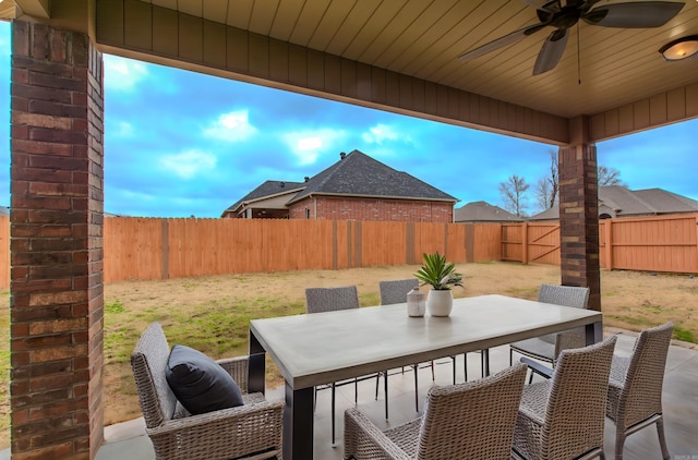 view of patio featuring ceiling fan