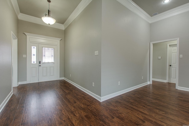 entrance foyer with ornamental molding and dark wood-type flooring