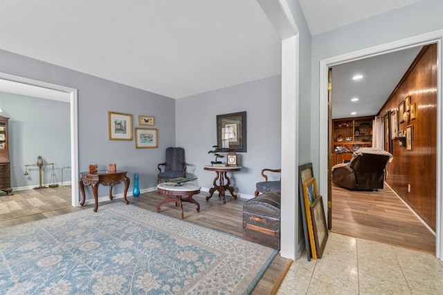 living area featuring tile patterned floors