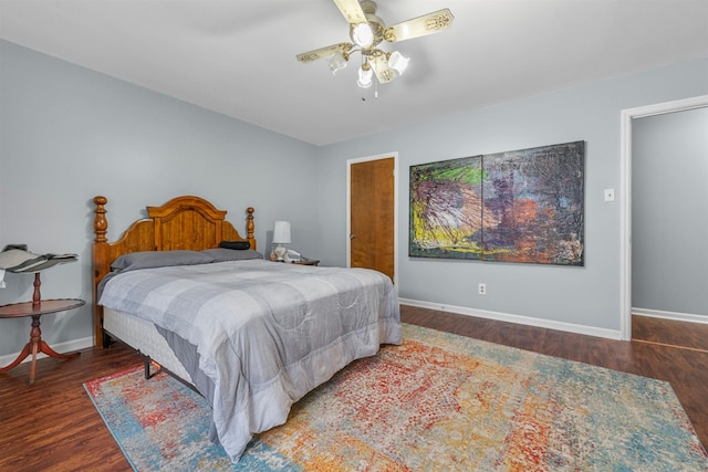 bedroom featuring ceiling fan and dark hardwood / wood-style flooring