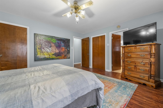 bedroom featuring ceiling fan and dark hardwood / wood-style floors