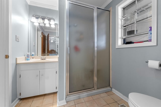 bathroom with tile patterned flooring, vanity, crown molding, and a shower with shower door