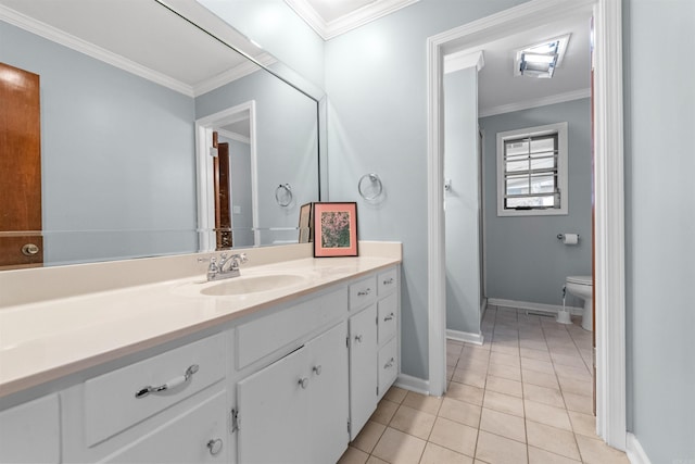 bathroom featuring vanity, tile patterned floors, ornamental molding, and toilet