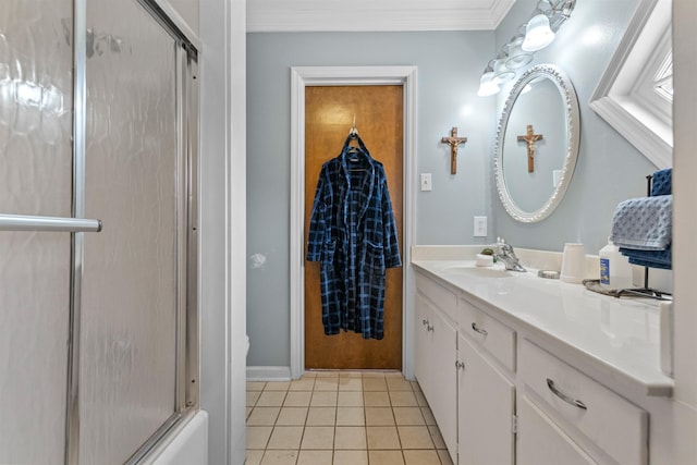 bathroom with ornamental molding, vanity, bath / shower combo with glass door, and tile patterned flooring