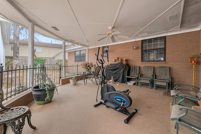 view of patio featuring ceiling fan